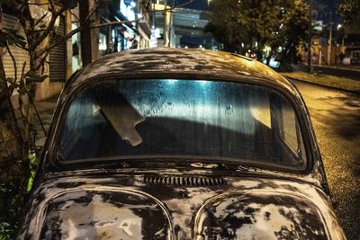 Close-up of abandoned car