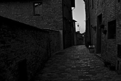 Narrow alley in front of building