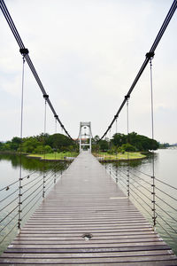 Pier on bridge against sky