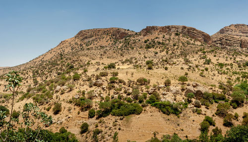 Scenic view of mountains against clear sky