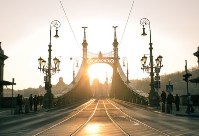 View of liberty bridge against sky during sunset