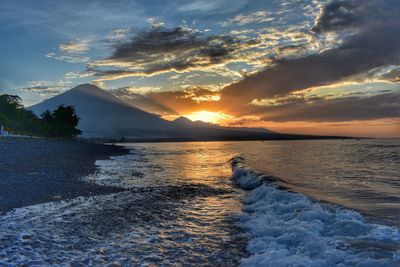 Scenic view of sea against sky during sunset