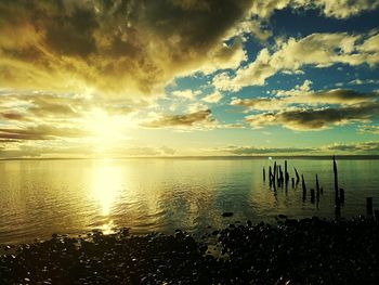 Scenic view of sea against sky during sunset