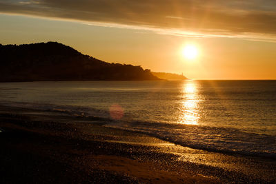 Scenic view of sea against sky during sunset