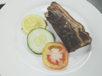 Close-up of served food in plate