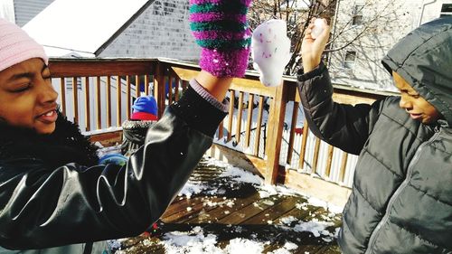 People in traditional clothing during winter