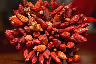 Close-up of red flowers on table