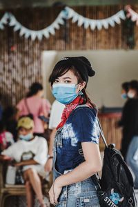 Portrait of girl standing outdoors