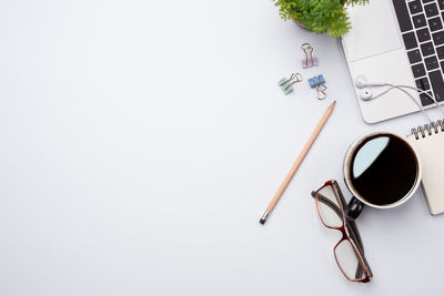 High angle view of coffee cup on table