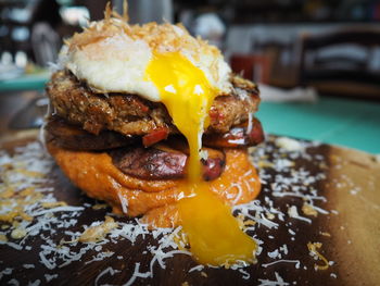 Close-up of burger served on table