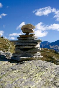 Stack of stones against sky