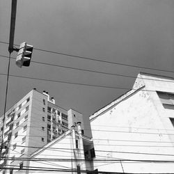 Low angle view of buildings against clear sky