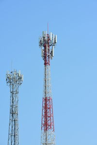 Low angle view of communications tower against sky