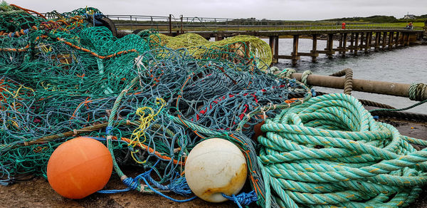 Fishing net on pier at harbor