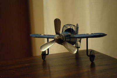 Close-up of airplane on table