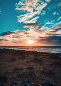 Scenic view of sea against sky during sunset