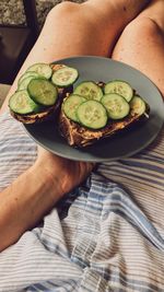 High angle view of person holding food