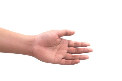 Close-up of hands over white background