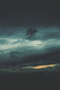 Scenic view of dramatic sky during sunset