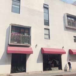 People in front of building