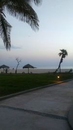 Scenic view of beach against clear sky