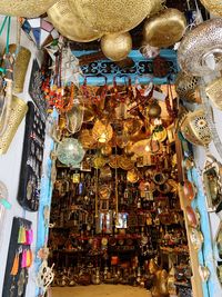 Low angle view of lanterns hanging in market stall