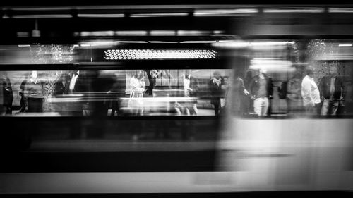 Blurred motion of train at railroad station