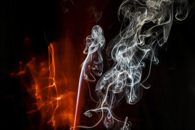 Smoke emitting from fire at night
