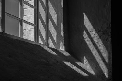 Shadow of window on wall of house