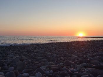 Scenic view of sea at sunset