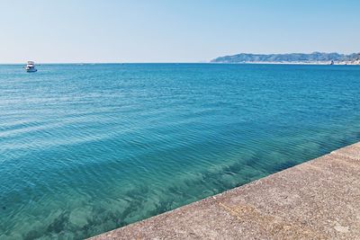 Scenic view of sea against clear sky