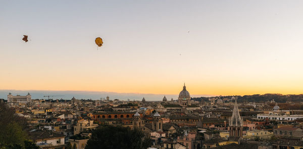 Rome cityscape against sky during sunset