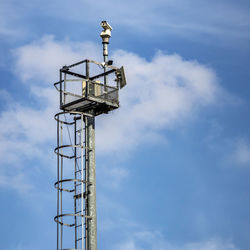 High tower for monitoring traffic with a video camera.