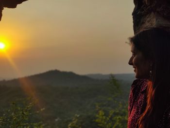 Girl watching sunset