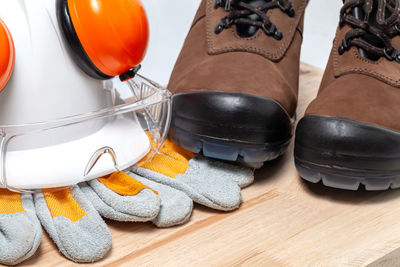 Close-up of shoes on table