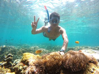 Man swimming in sea