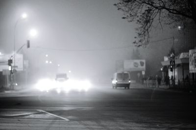 Illuminated street light at night