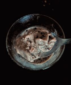 Close-up of ice cream against black background