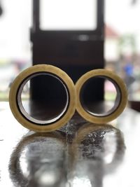 Close-up of wedding rings on table