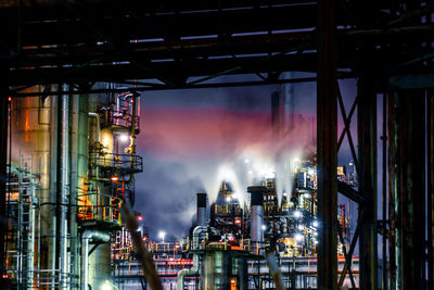 Illuminated factory at night