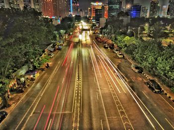 High angle view of light trails on city street