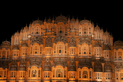 Low angle view of historical building against sky at night