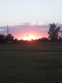 Scenic view of landscape at sunset