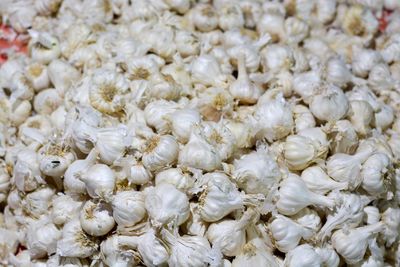Full frame shot of garlics in market