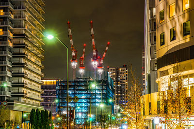 Illuminated buildings in city at night