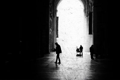 People walking in corridor