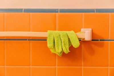 Close-up of glove in bathroom