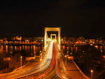 High angle view of illuminated bridge at night