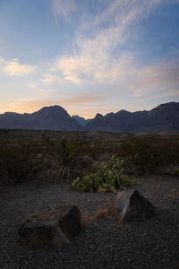Scenic view of mountains against sky during sunset
