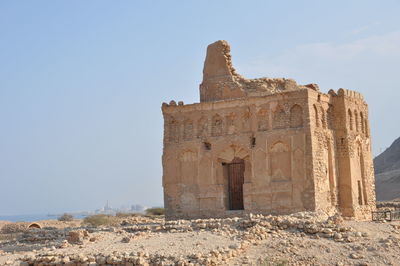 Old ruins of temple against clear sky